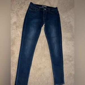Levi’s 535 Super Skinny Dark Blue jeans.